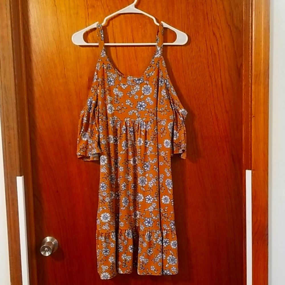Mustard, white, and blue floral dress.